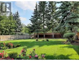 Sunroom - 240 Canterville Drive Sw, Calgary, AB T2W3X2 Photo 13