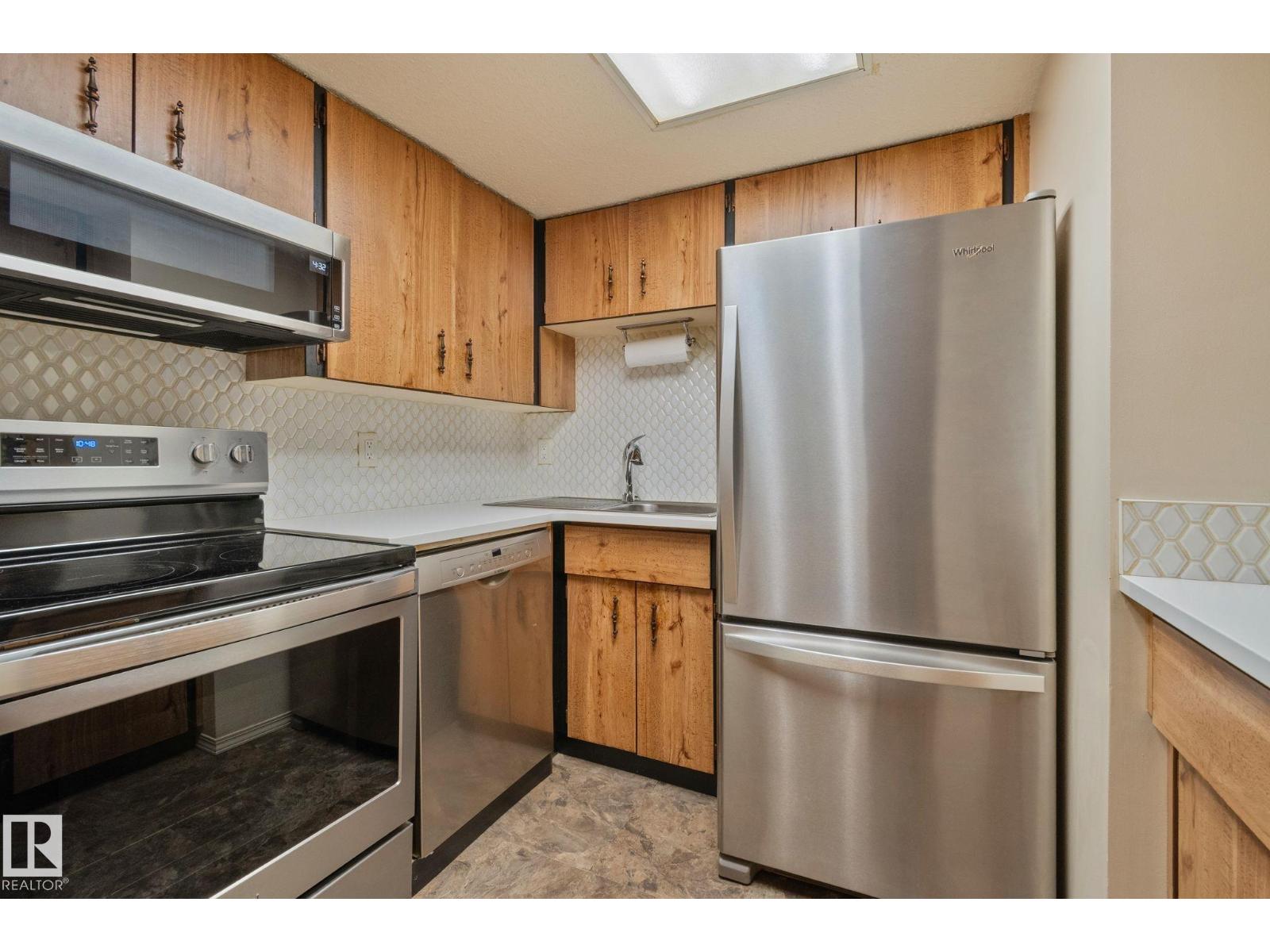 #305 10335 118 ST NW - 13