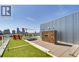 310, 1087 2 Avenue NW - photo 1