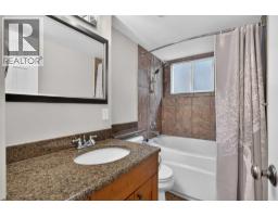 112 Beaconsfield Rise Nw, Calgary, AB T3K1X4 Photo 30