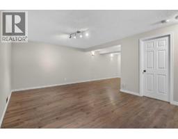 112 Beaconsfield Rise Nw, Calgary, AB T3K1X4 Photo 32