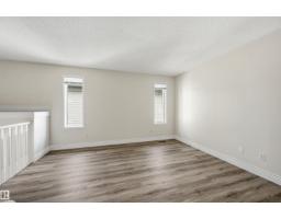 Bedroom 2 - 11615 8 Av Nw, Edmonton, AB T6J6Z8 Photo 6