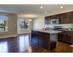 Laundry room - 9645 Simpson Pl Nw, Edmonton, AB T6R0T8 Photo 7