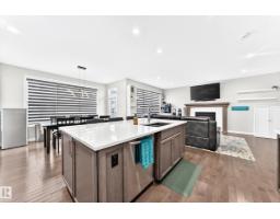 Laundry room - 5718 175a Av Nw, Edmonton, AB T5Y0T7 Photo 10