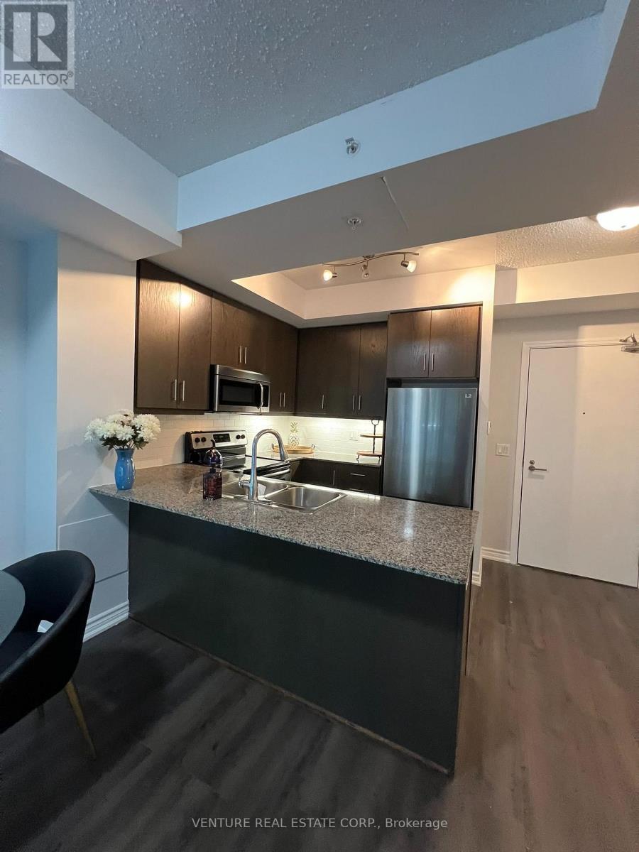 718 - 15 JAMES FINLAY WAY, Toronto (Downsview-Roding-CFB) — photo 4