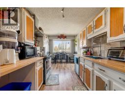 Laundry room - 3921 Harmony Place, Taber, AB T1G1A2 Photo 8