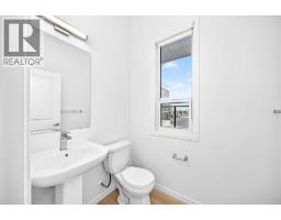 Primary Bedroom - 105, 20295 Seton Way Se, Calgary, AB T3M3X3 Photo 10