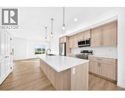 Laundry room - 105, 20295 Seton Way Se, Calgary, AB T3M3X3 Photo 13