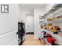 Laundry room - 48 Southborough Lane, Cochrane, AB T4C3J4 Photo 10