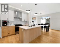 Kitchen - 48 Southborough Lane, Cochrane, AB T4C3J4 Photo 12