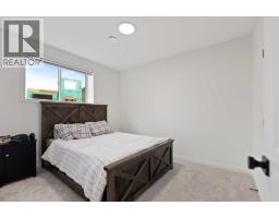 48 Southborough Lane, Cochrane, AB T4C3J4 Photo 34
