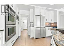 Laundry room - 4 Silverado Saddle Court Sw, Calgary, AB T2X0J1 Photo 10