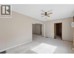 Living room - 3987 Yellowhead Highway, Kamloops, BC V2H1K6 Photo 8