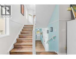 Family room - 66 Kingsland Villas Sw, Calgary, AB T2V5J9 Photo 11