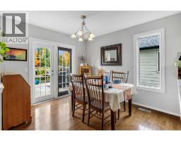 Living room - 175 Coverton Heights Ne, Calgary, AB T3K5B2 Photo 6
