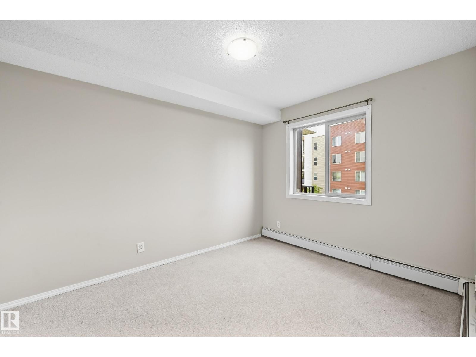 #215 11804 22 AV SW - 22