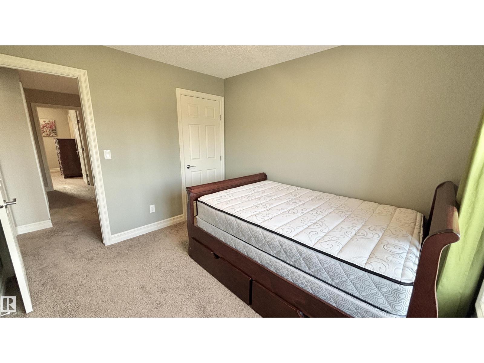 #2 – 2003 Rabbit Hill Road NW, Magrath Heights — photo 26 of 30: Property photo