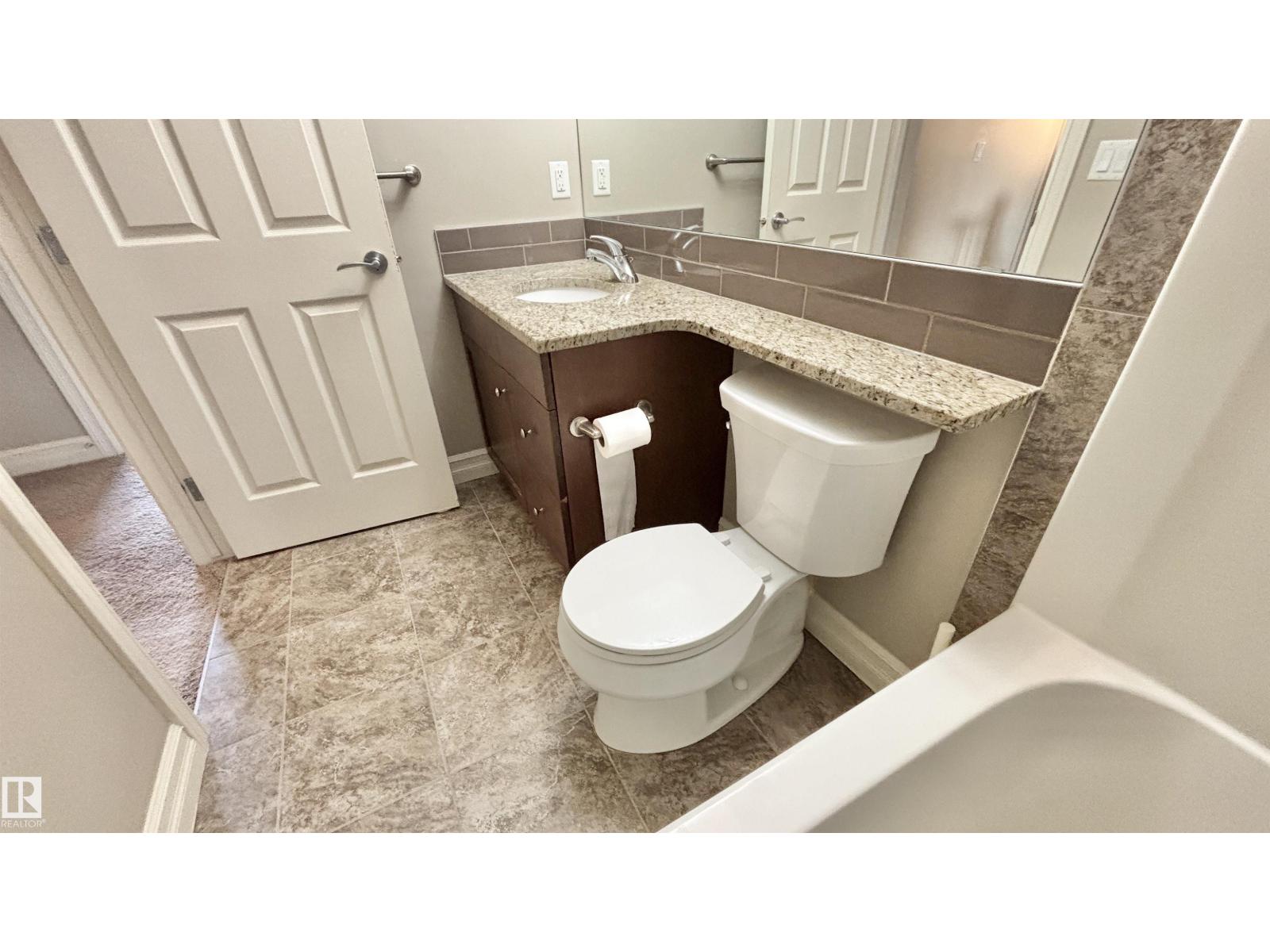 #2 – 2003 Rabbit Hill Road NW, Magrath Heights — photo 30 of 30: Property photo