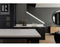 Laundry room - 102, 8155 8 Avenue Sw, Calgary, AB T3H6B1 Photo 10