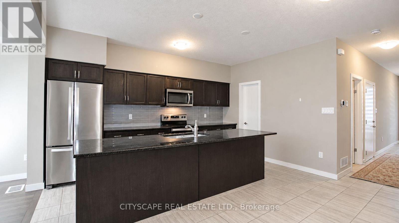 908 Robert Ferrie Drive, Kitchener, Ontario, N2R0P2, Kitchener, Ontario — photo 4 of 5