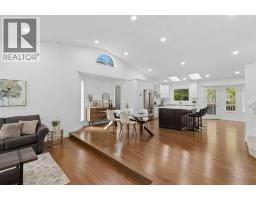 Living room - 128 Sunvista Close Se, Calgary, AB T2X2S2 Photo 6
