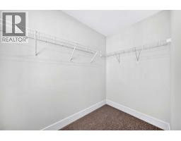 246 Greystone Boulevard, Cochrane, AB T4C3P2 Photo 22
