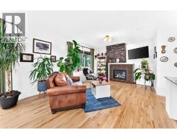 Bedroom - 64 Sunset Square, Cochrane, AB T4C0H4 Photo 8