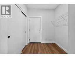 Laundry room - 1040 Sailfin Heath, Rural Rocky View County, AB T3Z0K1 Photo 12