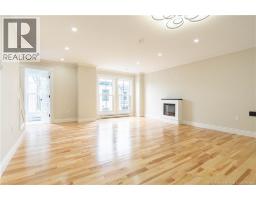 Electric fireplace and large bright windows