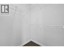 Primary Bedroom - 12 Hotchkiss Parade Se, Calgary, AB T3S0X5 Photo 8