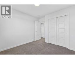 Bedroom - 12 Hotchkiss Parade Se, Calgary, AB T3S0X5 Photo 11