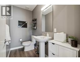 132 Quesnay Wood Link Sw, Calgary, AB T3E8H6 Photo 16