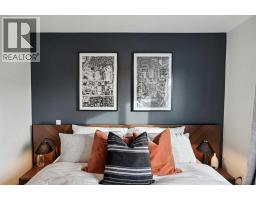 132 Quesnay Wood Link Sw, Calgary, AB T3E8H6 Photo 21