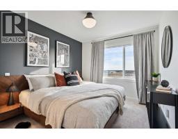 132 Quesnay Wood Link Sw, Calgary, AB T3E8H6 Photo 20