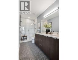 132 Quesnay Wood Link Sw, Calgary, AB T3E8H6 Photo 23