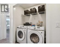132 Quesnay Wood Link Sw, Calgary, AB T3E8H6 Photo 19