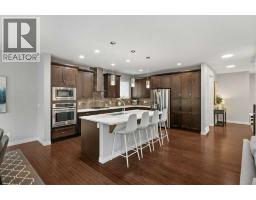 Laundry room - 57 Riviera View, Cochrane, AB T4C0Y7 Photo 10