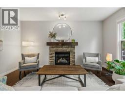 Living room - 57 Riviera View, Cochrane, AB T4C0Y7 Photo 6