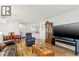 Living room - 209, 4507 45 Street, Calgary, AB T3E6K7 Photo 8