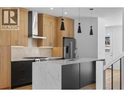 Laundry room - 1113 Sailfin Heath, Rural Rocky View County, AB T3Z0J6 Photo 12
