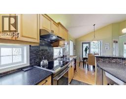 18 Tuscany Meadows Heights Nw, Calgary, AB T3L2L2 Photo 9