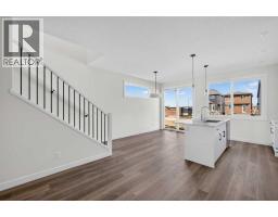 Primary Bedroom - 202 Starling Boulevard Nw, Calgary, AB T3P3E1 Photo 6