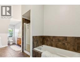 115 Couture Crescent Sw, Calgary, AB T3E7R3 Photo 27