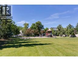 115 Couture Crescent Sw, Calgary, AB T3E7R3 Photo 36