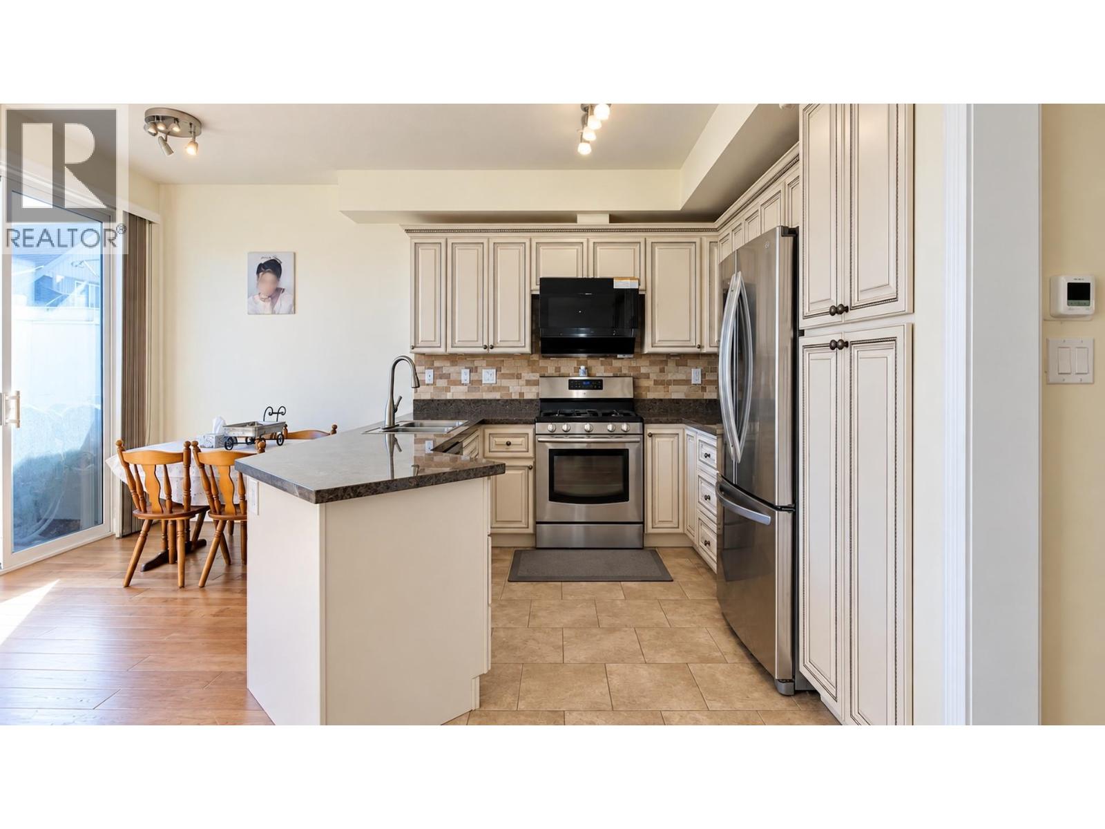 408 1485 PARKWAY BOULEVARD, Coquitlam - Image 1