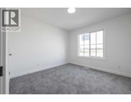 27 Nova Road, Cochrane, AB T4C3R5 Photo 24