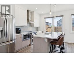 Laundry room - 135 Creekstone Drive Sw, Calgary, AB T2X4Y3 Photo 11