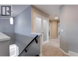 Family room - 26 Walden Court Se, Calgary, AB T2X0N8 Photo 12