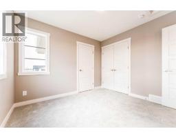 Bedroom - 63 Waterford Mews, Chestermere, AB T1X3B7 Photo 10
