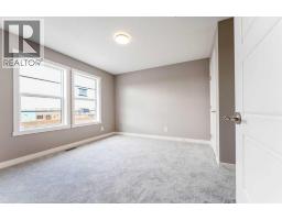Laundry room - 63 Waterford Mews, Chestermere, AB T1X3B7 Photo 13